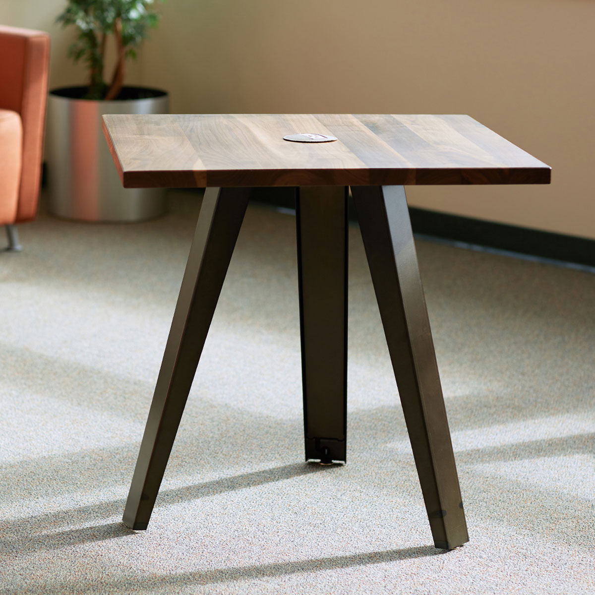 standard height table with three angled legs